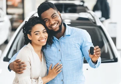 Image of a couple holding car keys